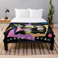 Colorful 80s style plush blanket with vibrant retro colors and abstract pop art graphic design