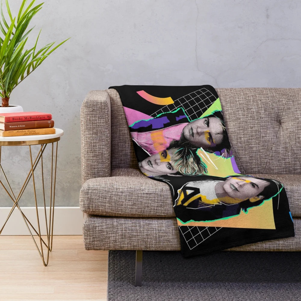 Colorful 80s style plush blanket with vibrant retro colors and abstract pop art graphic design