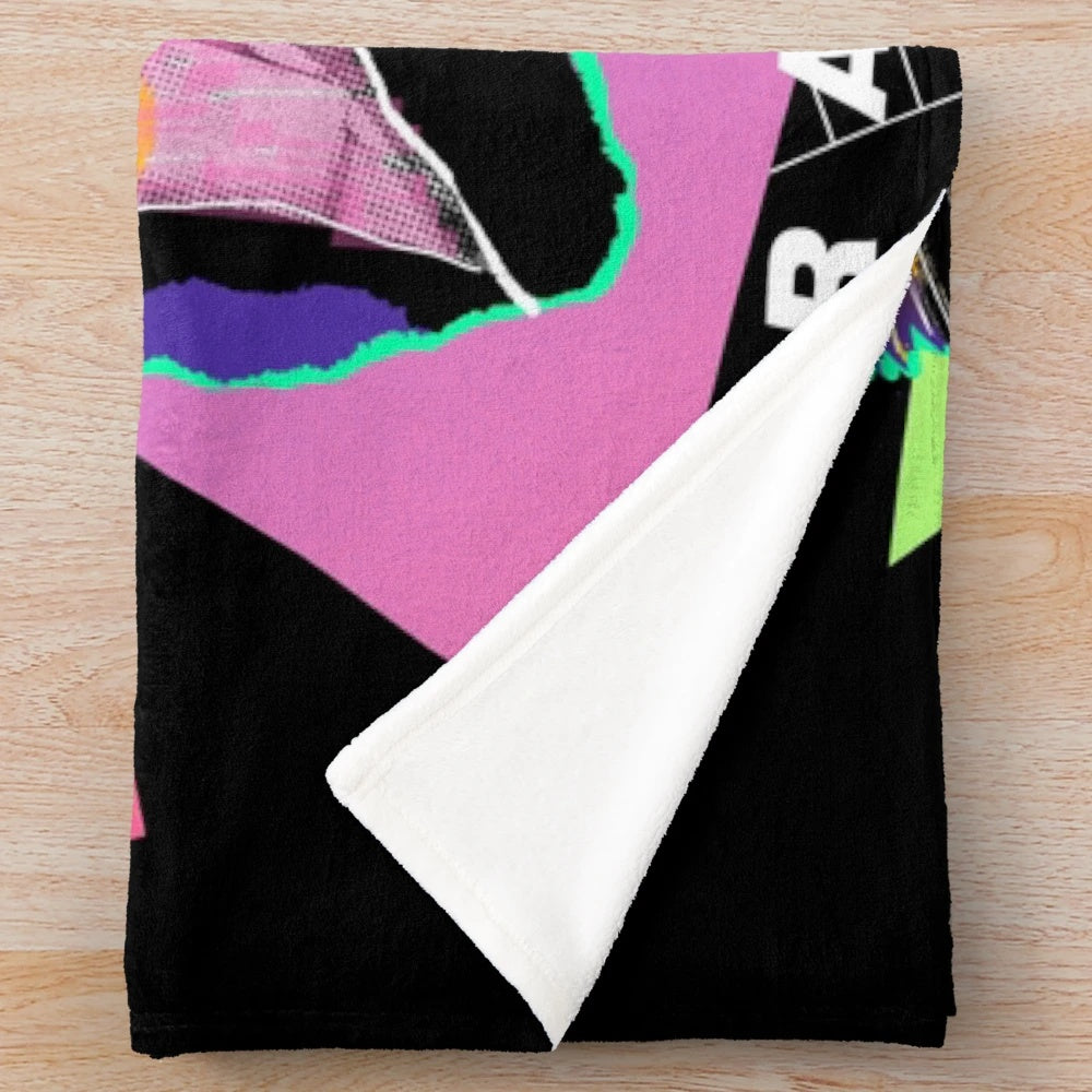 Colorful 80s style plush blanket with vibrant retro colors and abstract pop art graphic design