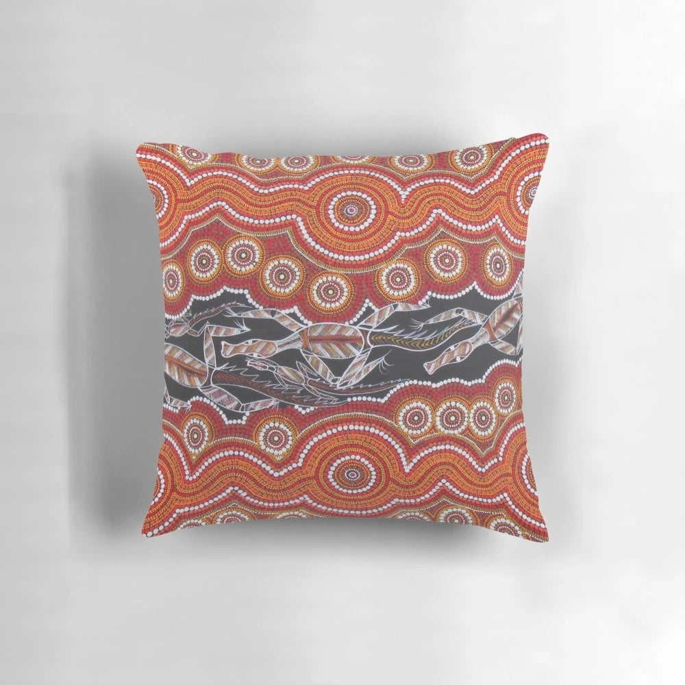 Colorful Australian aboriginal art pillow featuring traditional indigenous dot painting design