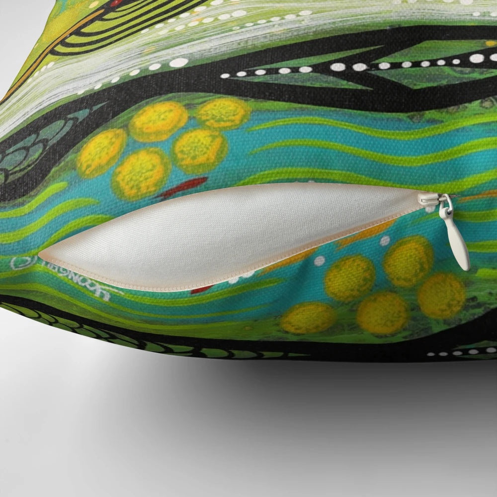Colorful pillow featuring a Yoongali-designed aboriginal art print of a wattle flower, an iconic Australian native plant.