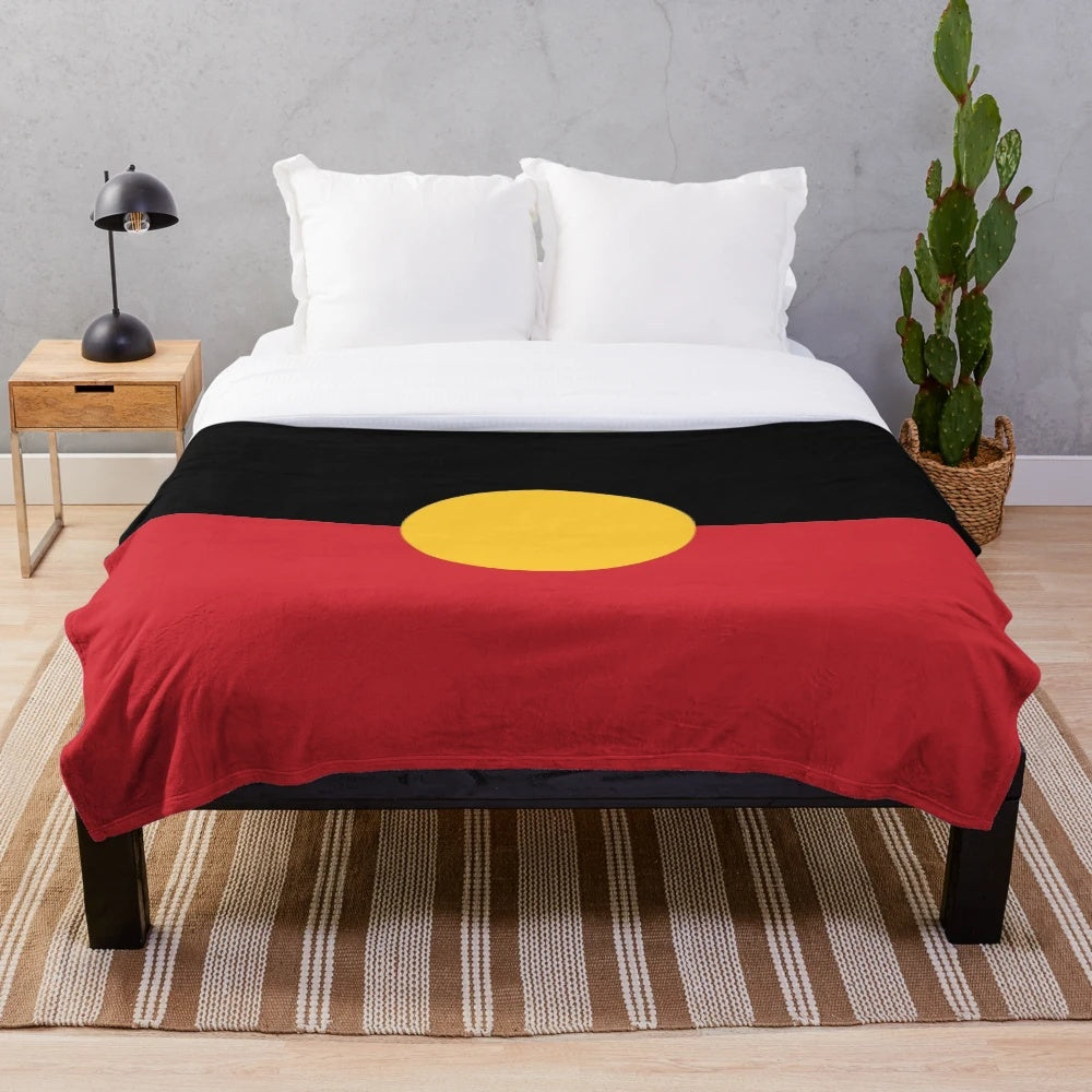 Aboriginal Flag #3 Plush Blanket with bold red, black, and yellow design