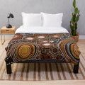 Vibrant aboriginal-inspired plush blanket with colorful jigsaw puzzle design