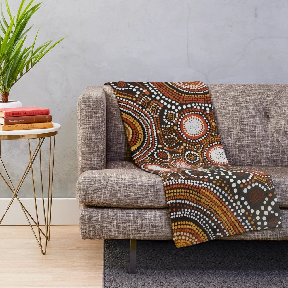 Vibrant aboriginal-inspired plush blanket with colorful jigsaw puzzle design