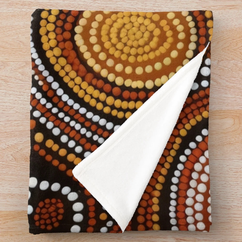 Vibrant aboriginal-inspired plush blanket with colorful jigsaw puzzle design