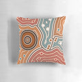 Colorful aboriginal-inspired dot painting design on a throw pillow for home decor