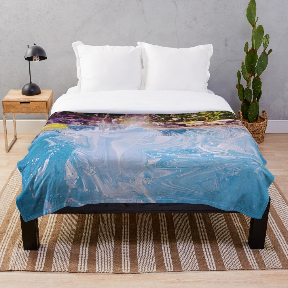 Colorful abstract patterned plush blanket