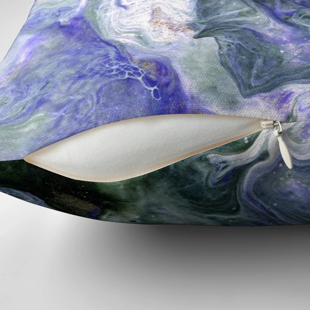 Colorful abstract fluid art decorative pillow featuring shades of purple, green, and gold.