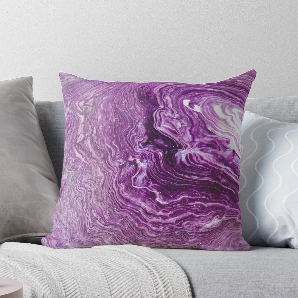 Vibrant abstract acrylic pour painting on a soft, plush throw pillow