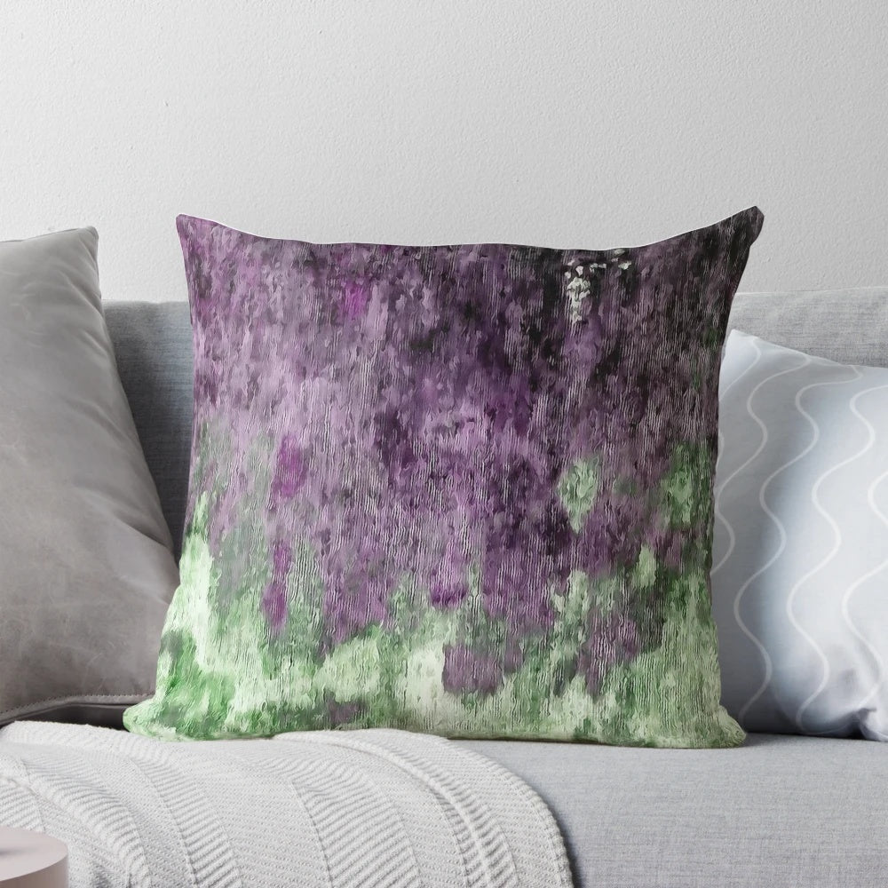 Colorful abstract art painting in purple and green tones on a modern throw pillow.