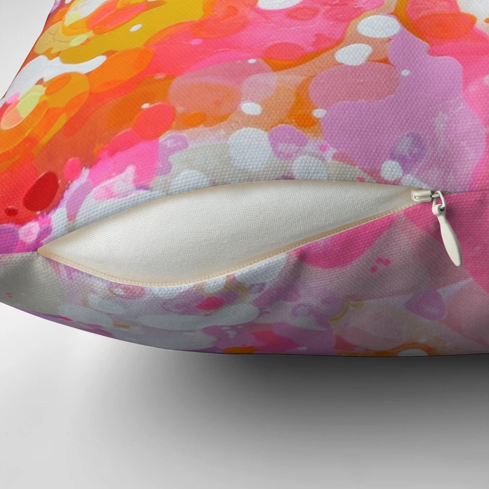 Vibrant abstract painting in pink and purple hues on a large format pillow by Canadian artist Claire Desjardins