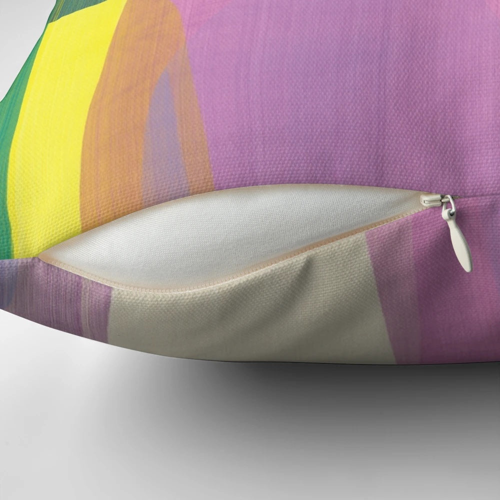 Colorful abstract art pillow featuring purple, blue, and tangerine tones designed by Canadian artist Claire Desjardins