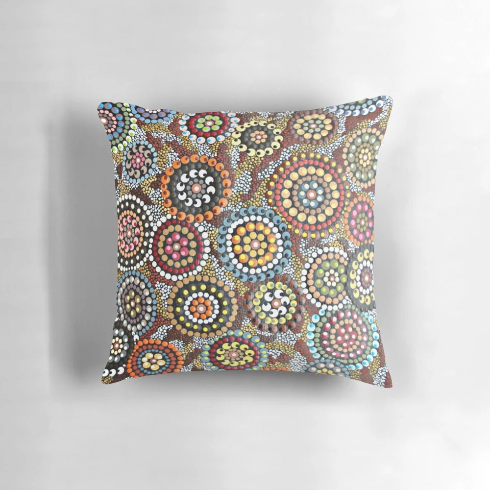 Circles of Life abstract art pillow with earthy, tribal-inspired design