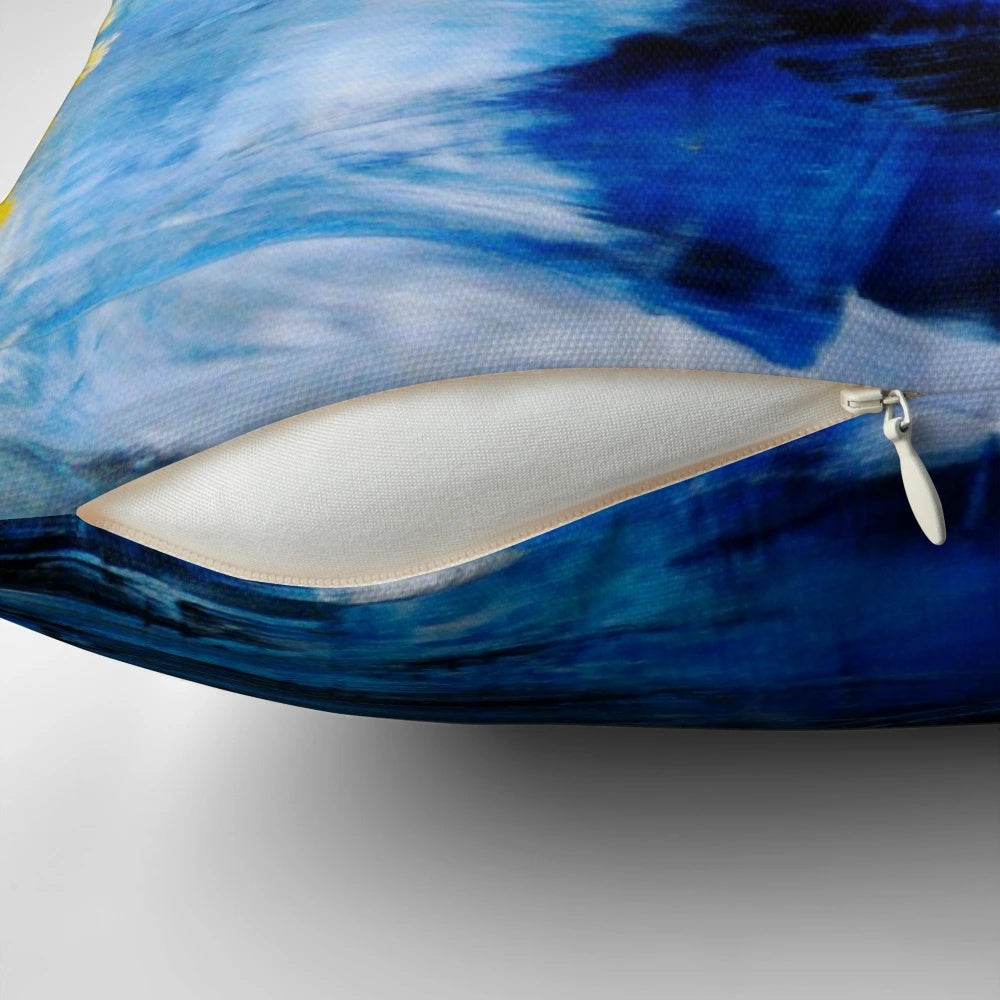 Colorful abstract art pillow in blue and yellow tones