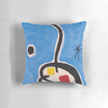 Colorful abstract pillow featuring geometric shapes and patterns reminiscent of the iconic artwork of Spanish artist Joan Miró.