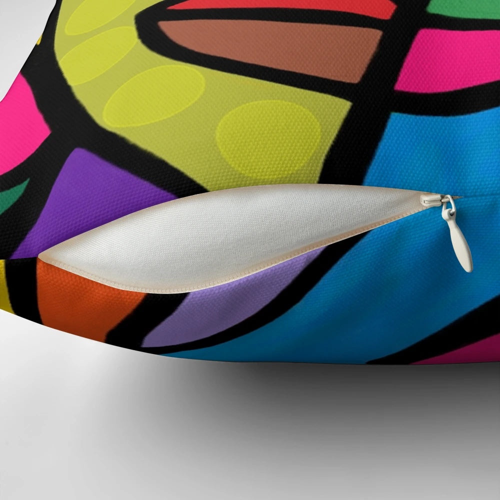 Colorful abstract art face design with dots and stripes on a throw pillow