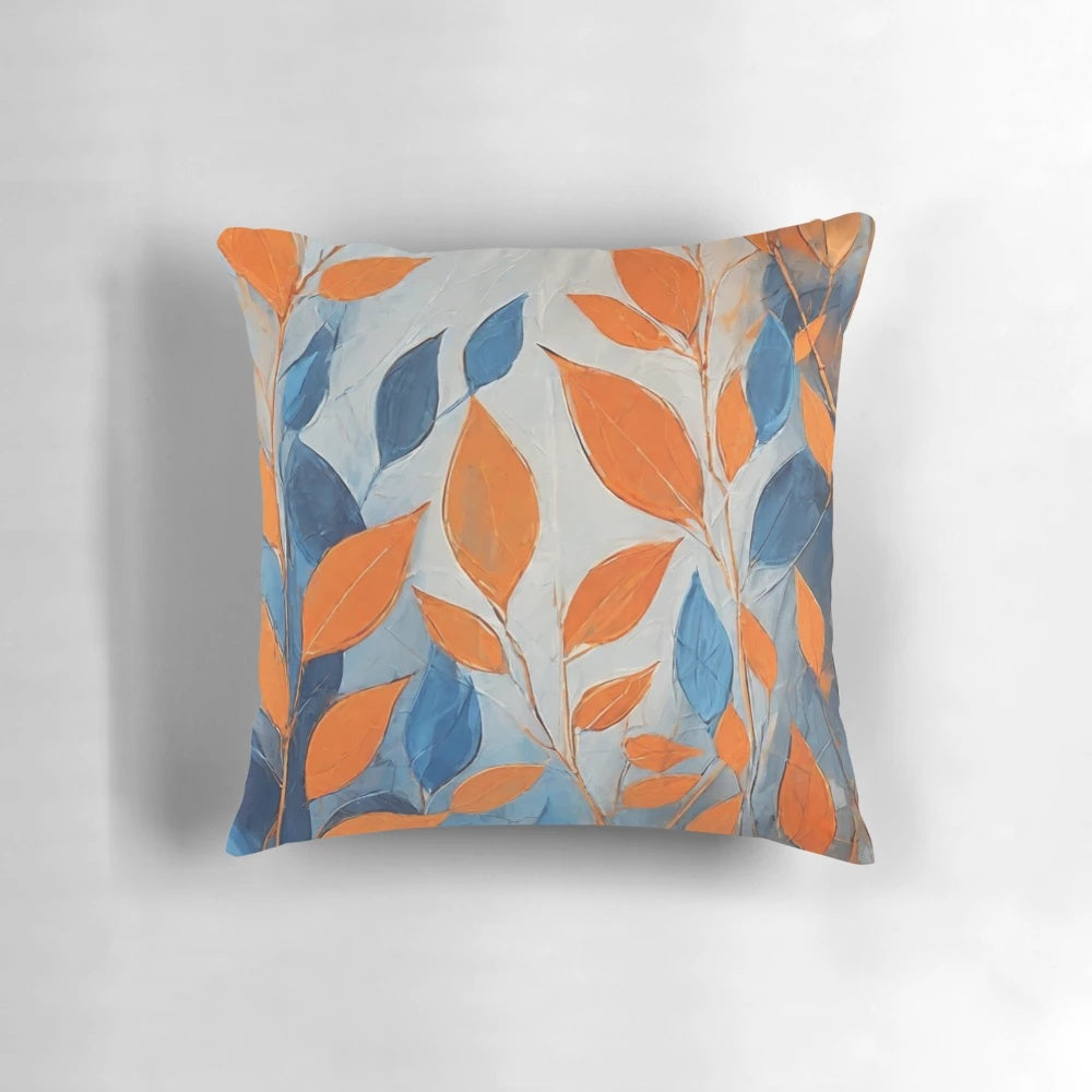 Throw pillow featuring an abstract design of blue and orange leaves