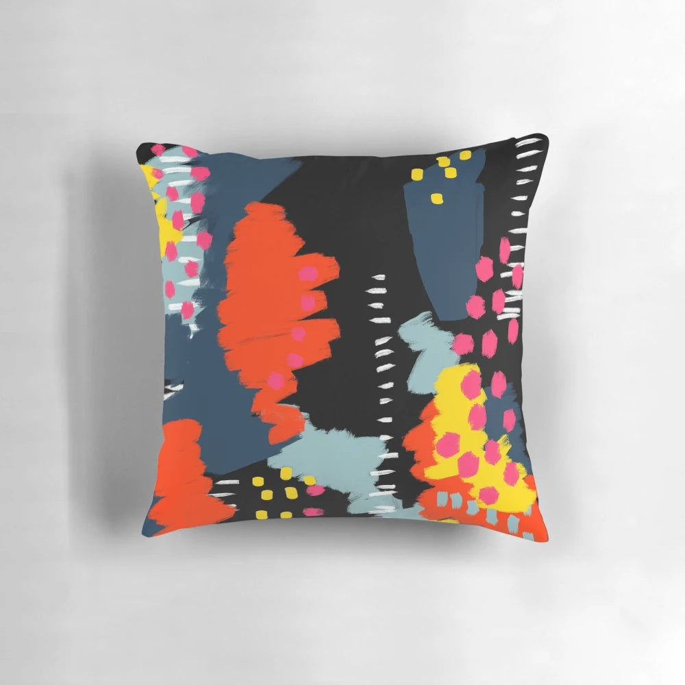 Dark abstract patterned pillow with bold, vibrant colors
