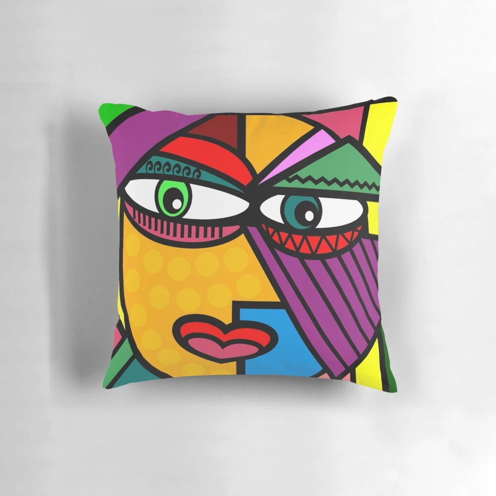 Colorful abstract art face design on a decorative throw pillow for living room or bedroom.