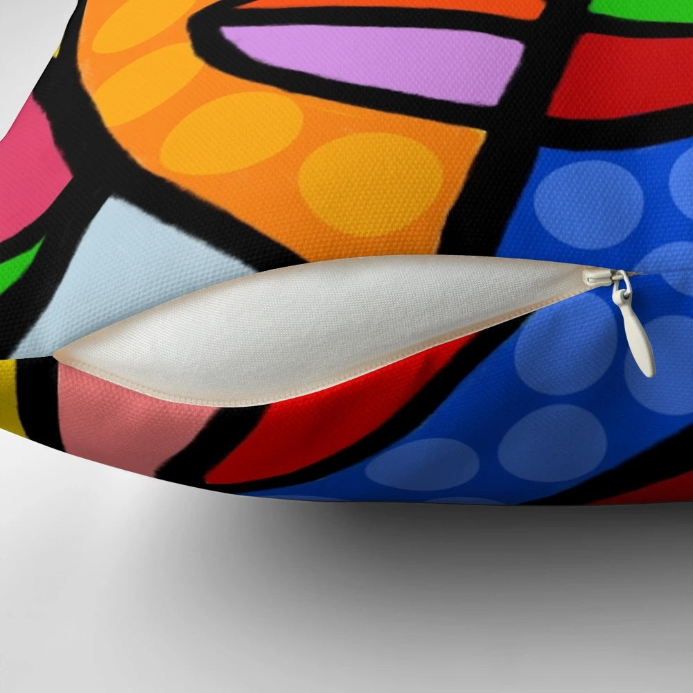 Colorful abstract art face design with dots and stripes on a decorative throw pillow