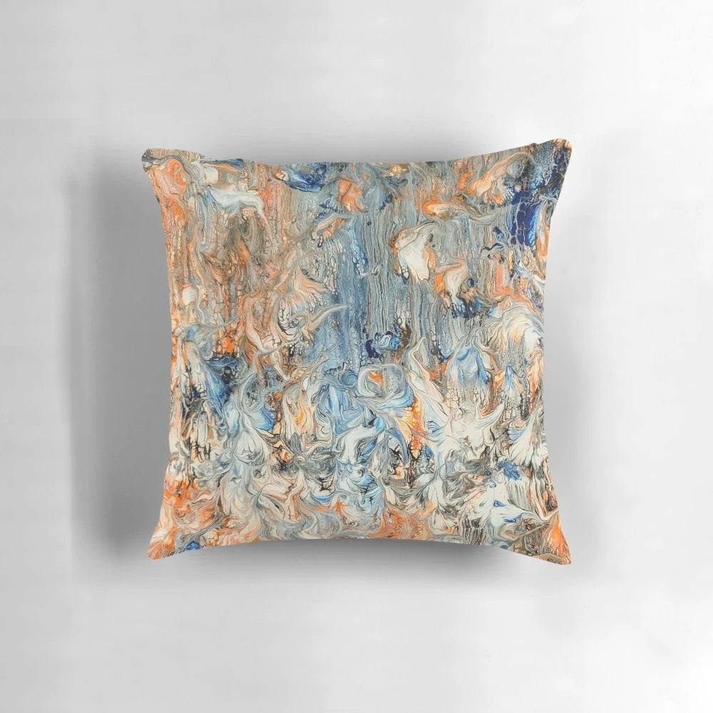 Decorative abstract floral throw pillow in complementary blue and orange colors