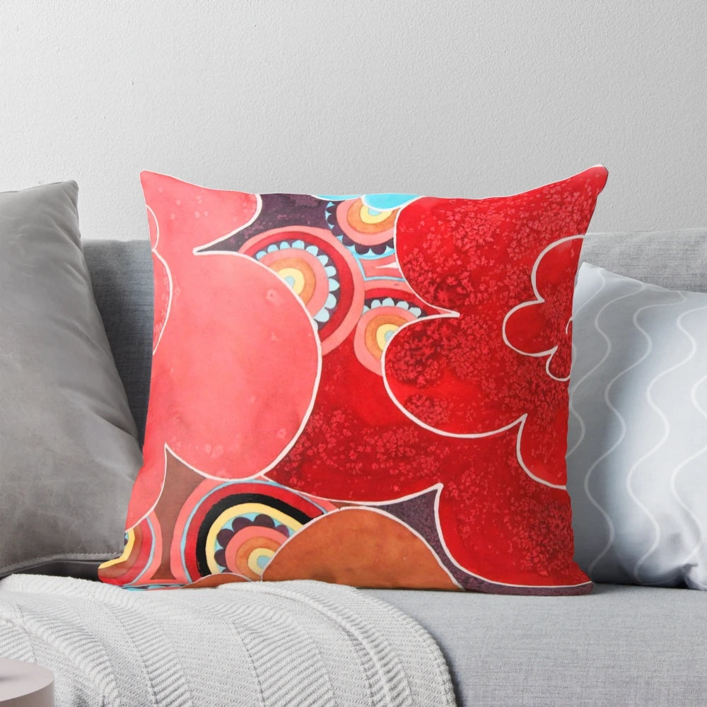 A stylish abstract floral pattern pillow in vibrant colors, perfect for modern home decor.