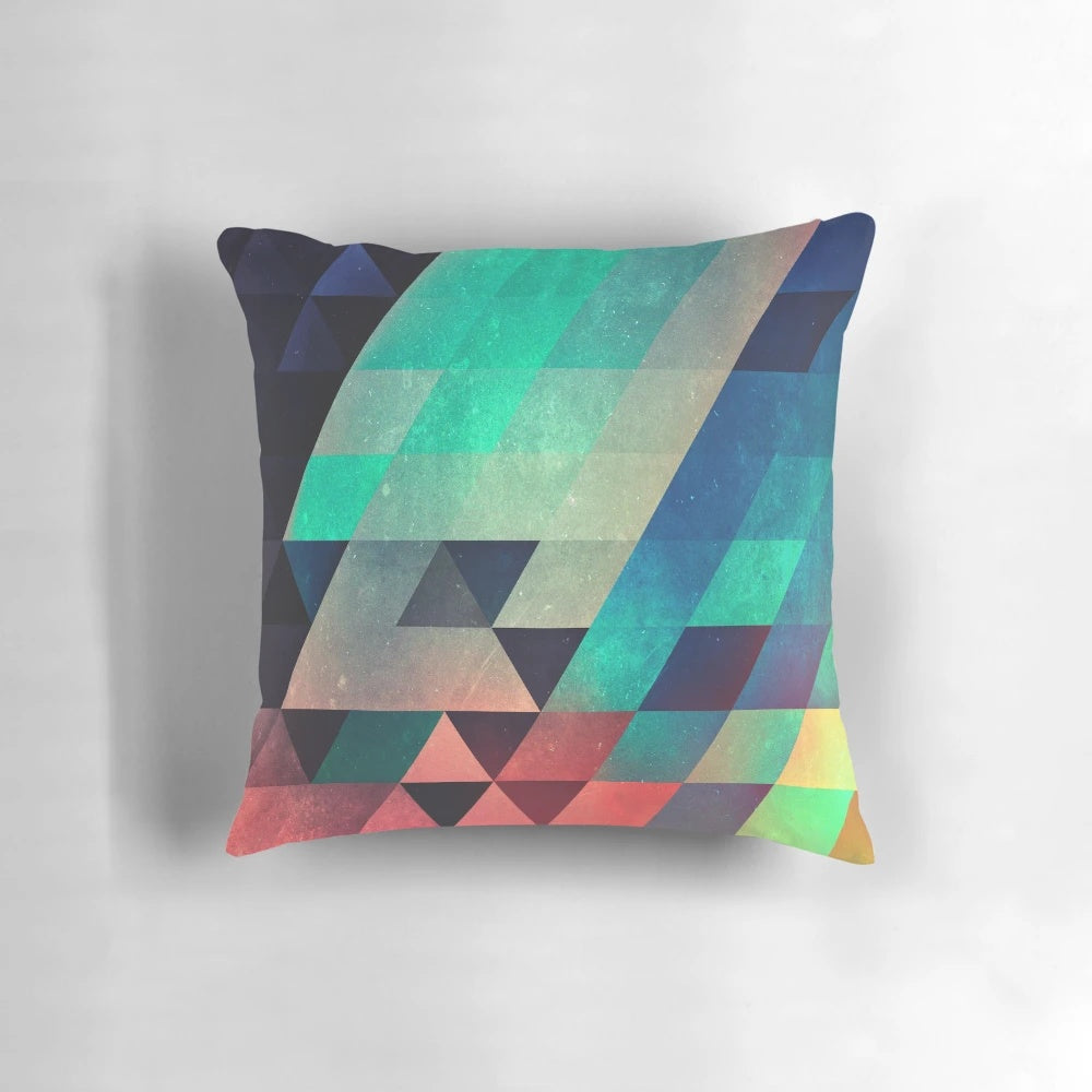 Vivid abstract geometric pillow with triangular patterns and depth