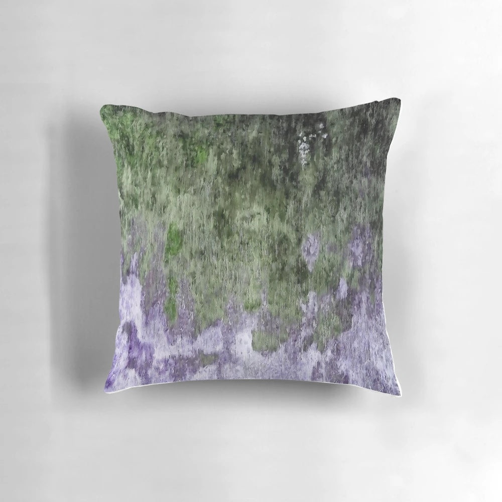 Abstract green and lilac painting on a throw pillow, showcasing a modern, expressive work of art.
