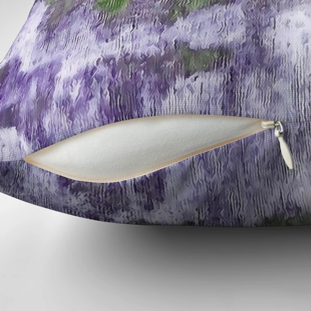 Abstract green and lilac painting on a throw pillow, showcasing a modern, expressive work of art.