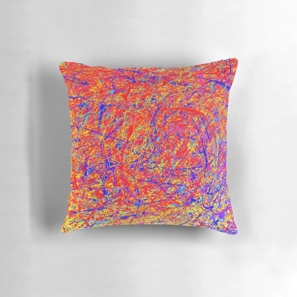 Vibrant abstract throw pillow with Jackson Pollock-inspired color splash design