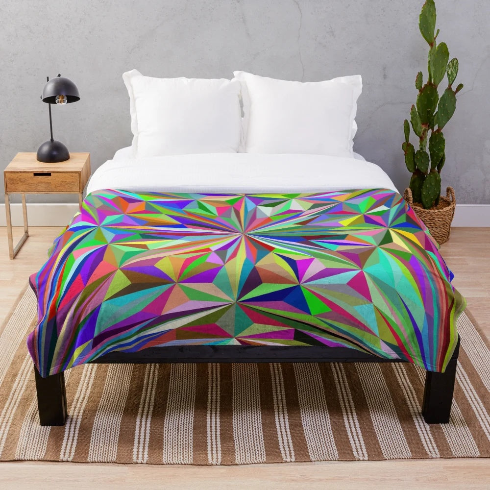 Colorful abstract kaleidoscope pattern on a cozy plush blanket
