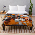 Colorful abstract paint splatter plush blanket