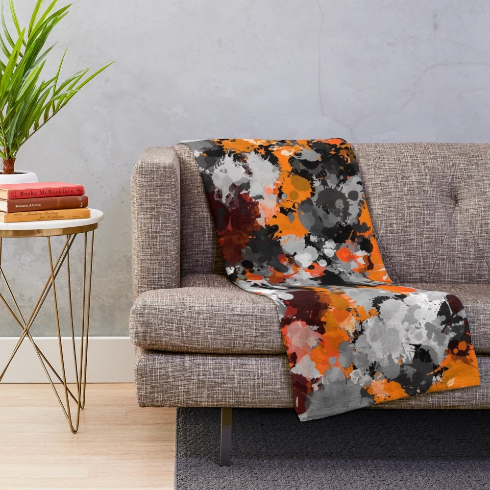 Colorful abstract paint splatter plush blanket