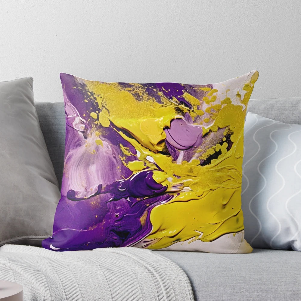 Colorful abstract paint design throw pillow in shades of purple and yellow