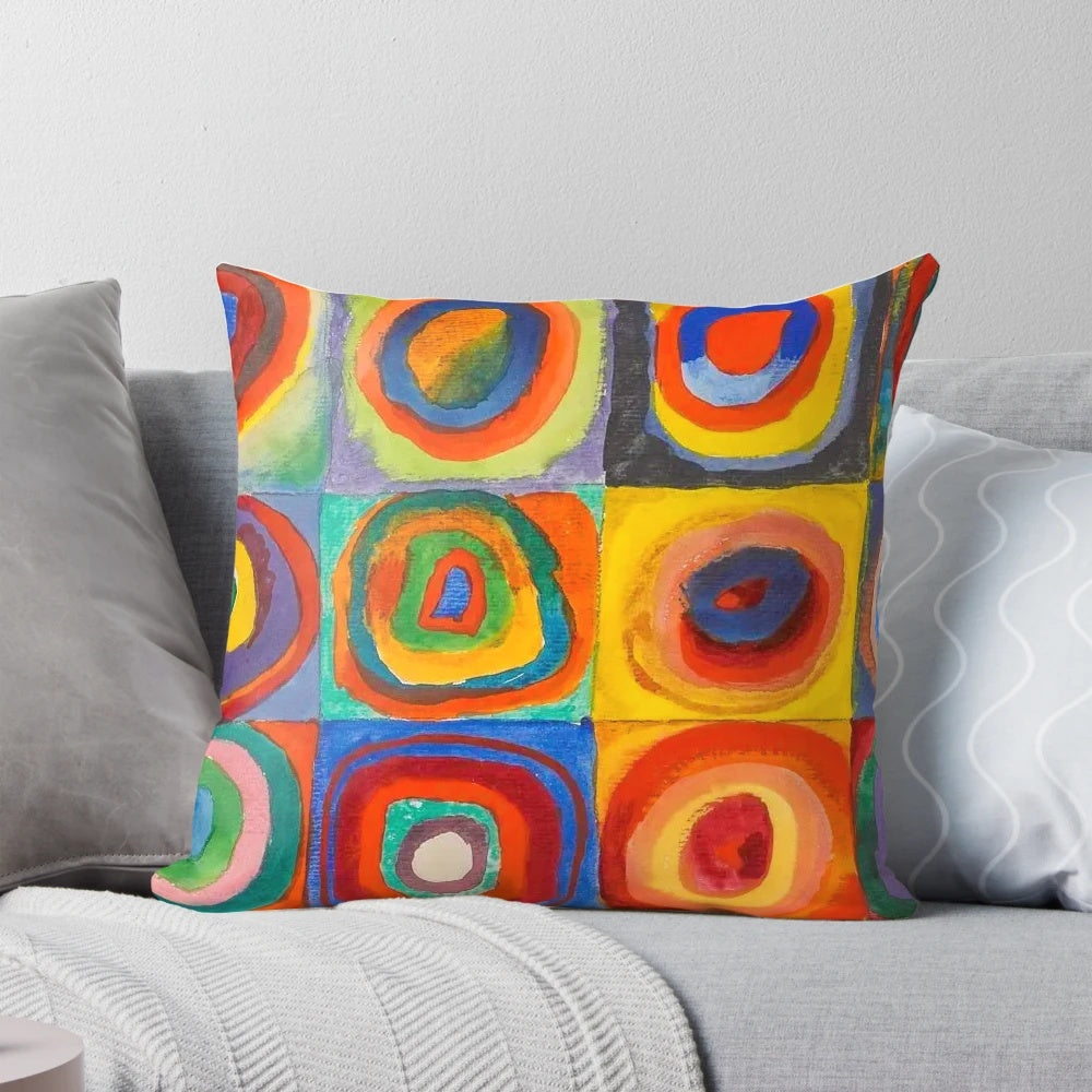 Colorful abstract geometric painting by Wassily Kandinsky depicting concentric circles and squares