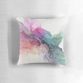 Colorful abstract painting on a canvas pillow with fluid, textured patterns in shades of turquoise, pink, coral, and violet.
