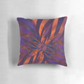 Colorful abstract pattern pillow featuring a fractal design in orange and purple