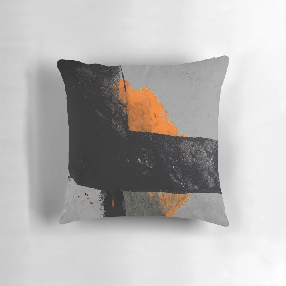 Minimal orange and black abstract pillow with textured brush strokes
