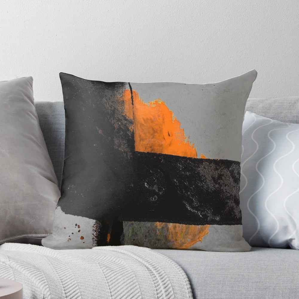 Minimal orange and black abstract pillow with textured brush strokes