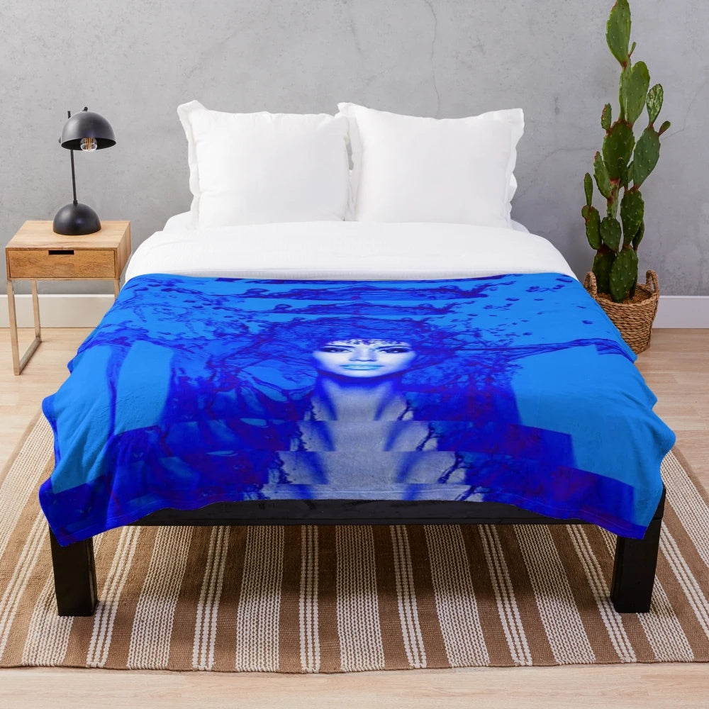 Soft, plush blue and white patterned blanket with abstract contemporary design
