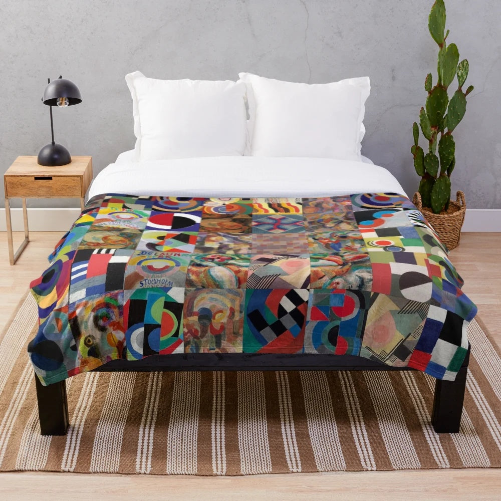 Colorful abstract plush blanket featuring the artistic designs of Ukrainian artist Sonia Delaunay