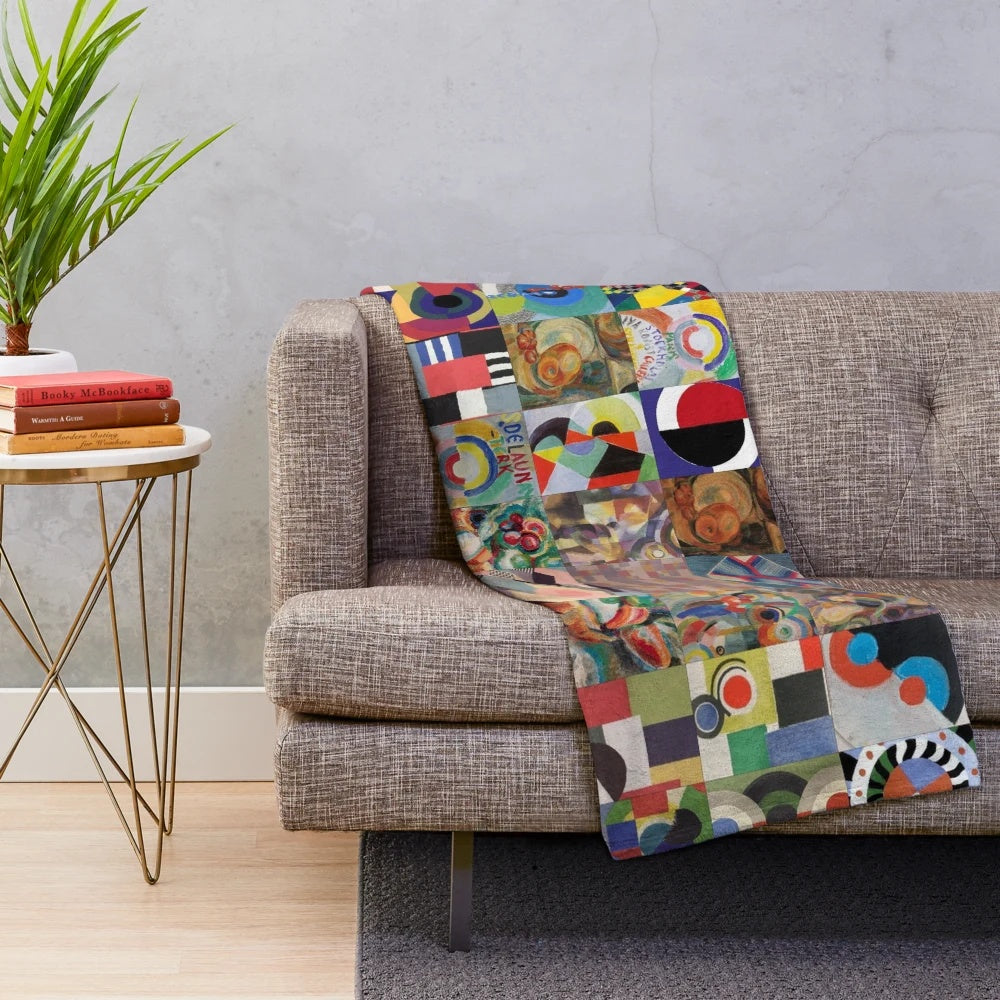 Colorful abstract plush blanket featuring the artistic designs of Ukrainian artist Sonia Delaunay
