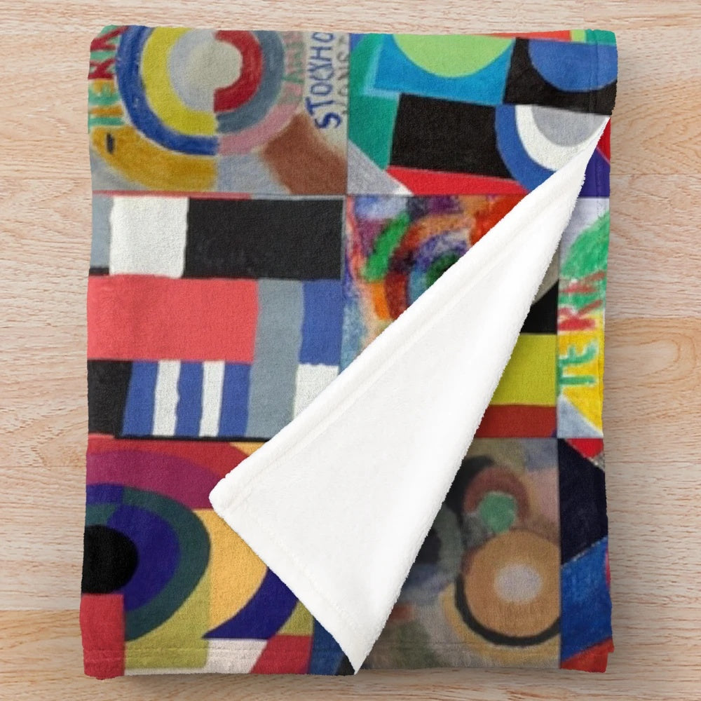 Colorful abstract plush blanket featuring the artistic designs of Ukrainian artist Sonia Delaunay