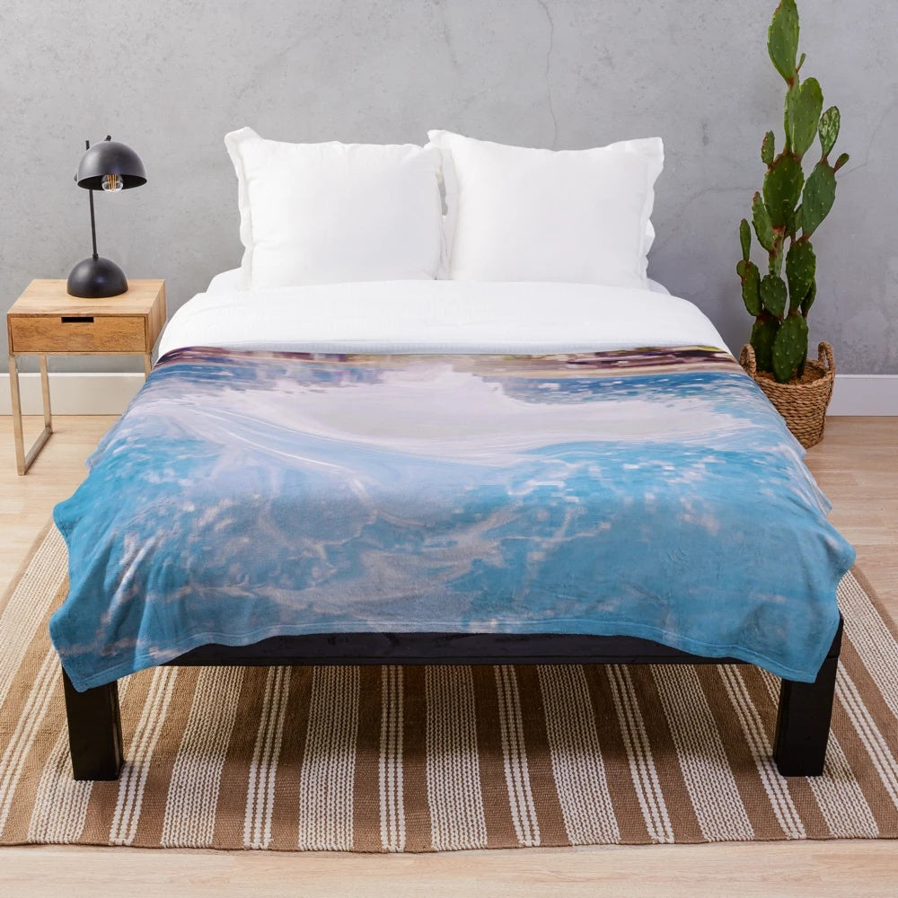 Colorful abstract patterned plush blanket with vibrant and psychedelic design