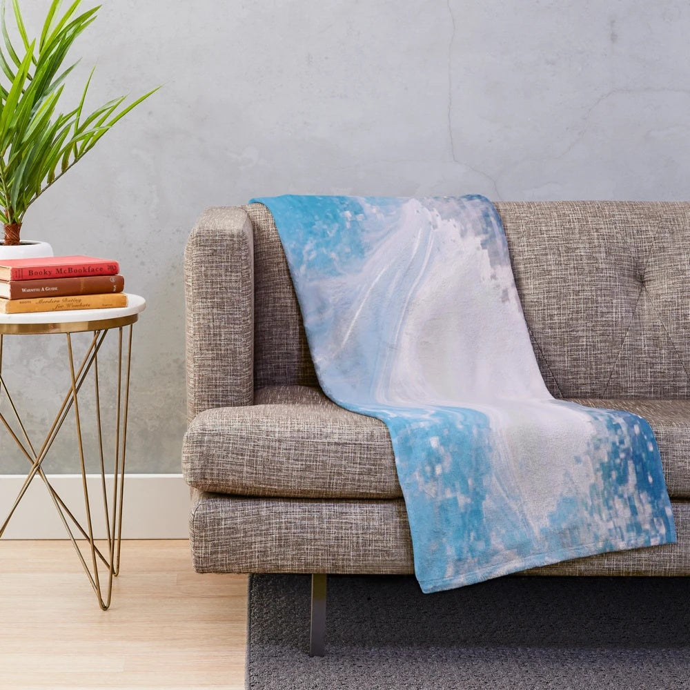 Colorful abstract patterned plush blanket with vibrant and psychedelic design