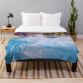 Colorful abstract splash pattern on a soft, modern plush blanket