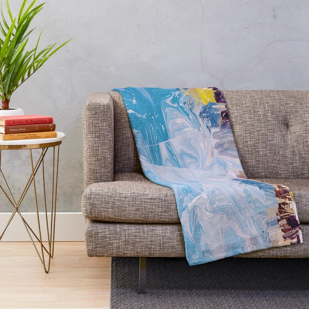 Colorful abstract splash pattern on a soft, modern plush blanket