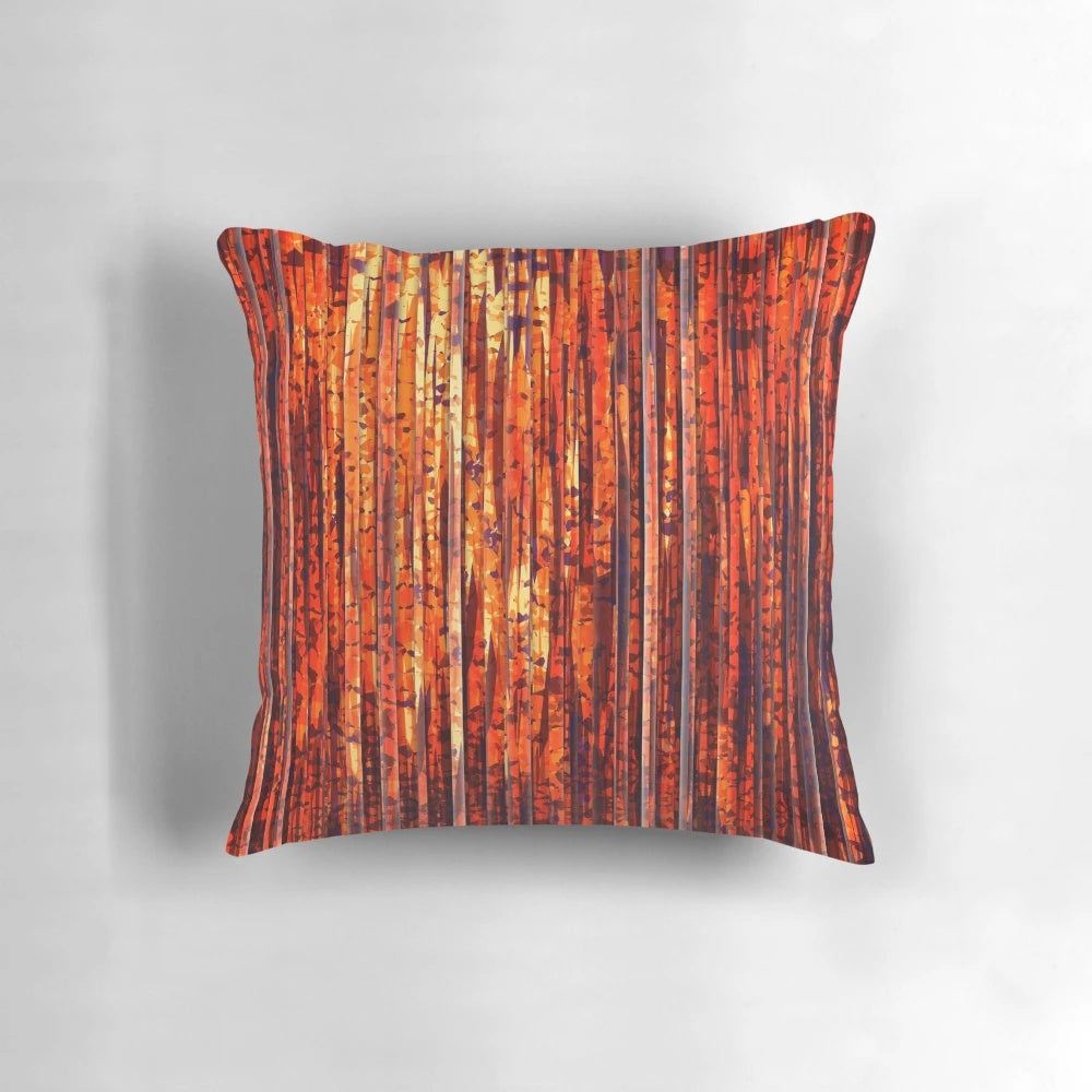 Decorative throw pillow with abstract orange and yellow stripe pattern