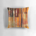 Vibrant abstract striped throw pillow with orange, yellow, and red tones for autumn home decor