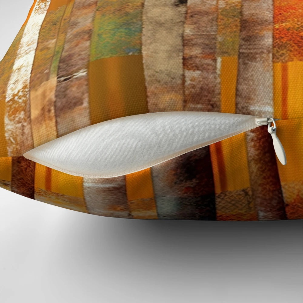 Vibrant abstract striped throw pillow with orange, yellow, and red tones for autumn home decor